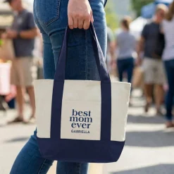 Best Mom Ever Mini Tote Bag .product-info-decoration { display: inline-flex; justify-content: space-between; align-items: center; border-radius: 0.4rem; background-color: #E8E8E8; padding: 0.2rem 0.4rem; font-size: 1.4rem; line-height: 1.6rem; font-weight: var(--font-weight-semibold); letter-spacing: 0.042rem; text-transform: uppercase; --decoration-icon-url: ''; /* will be dynamically set */}.product-info-decoration.badge-icon::before { content: ''; width: 2rem; height: 2rem; background: var(--decoration-icon-url) no-repeat; background-size: 100% 100%; display: block; margin-right: 0.4rem;} FULL-COLOR CUSTOMIZATION