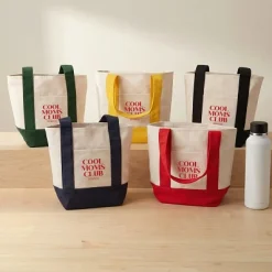 Cool Moms Club Mini Tote Bag .product-info-decoration { display: inline-flex; justify-content: space-between; align-items: center; border-radius: 0.4rem; background-color: #E8E8E8; padding: 0.2rem 0.4rem; font-size: 1.4rem; line-height: 1.6rem; font-weight: var(--font-weight-semibold); letter-spacing: 0.042rem; text-transform: uppercase; --decoration-icon-url: ''; /* will be dynamically set */}.product-info-decoration.badge-icon::before { content: ''; width: 2rem; height: 2rem; background: var(--decoration-icon-url) no-repeat; background-size: 100% 100%; display: block; margin-right: 0.4rem;} FULL-COLOR CUSTOMIZATION