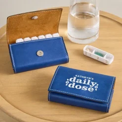 Daily Dose Travel Pill Organizer .product-info-decoration { display: inline-flex; justify-content: space-between; align-items: center; border-radius: 0.4rem; background-color: #E8E8E8; padding: 0.2rem 0.4rem; font-size: 1.4rem; line-height: 1.6rem; font-weight: var(--font-weight-semibold); letter-spacing: 0.042rem; text-transform: uppercase; --decoration-icon-url: ''; /* will be dynamically set */}.product-info-decoration.badge-icon::before { content: ''; width: 2rem; height: 2rem; background: var(--decoration-icon-url) no-repeat; background-size: 100% 100%; display: block; margin-right: 0.4rem;} Laser Engraved