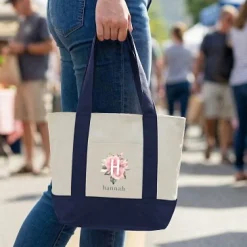 Floral Mini Tote Bag .product-info-decoration { display: inline-flex; justify-content: space-between; align-items: center; border-radius: 0.4rem; background-color: #E8E8E8; padding: 0.2rem 0.4rem; font-size: 1.4rem; line-height: 1.6rem; font-weight: var(--font-weight-semibold); letter-spacing: 0.042rem; text-transform: uppercase; --decoration-icon-url: ''; /* will be dynamically set */}.product-info-decoration.badge-icon::before { content: ''; width: 2rem; height: 2rem; background: var(--decoration-icon-url) no-repeat; background-size: 100% 100%; display: block; margin-right: 0.4rem;} FULL-COLOR CUSTOMIZATION