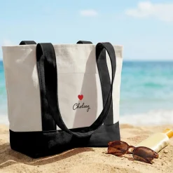 Heart & Name Mini Tote Bag .product-info-decoration { display: inline-flex; justify-content: space-between; align-items: center; border-radius: 0.4rem; background-color: #E8E8E8; padding: 0.2rem 0.4rem; font-size: 1.4rem; line-height: 1.6rem; font-weight: var(--font-weight-semibold); letter-spacing: 0.042rem; text-transform: uppercase; --decoration-icon-url: ''; /* will be dynamically set */}.product-info-decoration.badge-icon::before { content: ''; width: 2rem; height: 2rem; background: var(--decoration-icon-url) no-repeat; background-size: 100% 100%; display: block; margin-right: 0.4rem;} FULL-COLOR CUSTOMIZATION