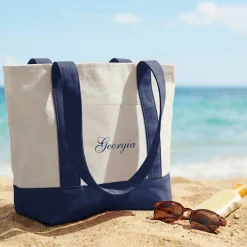 Name Mini Tote Bag .product-info-decoration { display: inline-flex; justify-content: space-between; align-items: center; border-radius: 0.4rem; background-color: #E8E8E8; padding: 0.2rem 0.4rem; font-size: 1.4rem; line-height: 1.6rem; font-weight: var(--font-weight-semibold); letter-spacing: 0.042rem; text-transform: uppercase; --decoration-icon-url: ''; /* will be dynamically set */}.product-info-decoration.badge-icon::before { content: ''; width: 2rem; height: 2rem; background: var(--decoration-icon-url) no-repeat; background-size: 100% 100%; display: block; margin-right: 0.4rem;} FULL-COLOR CUSTOMIZATION