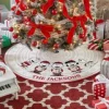 PEANUTS® Classic Caroling Quilted Tree Skirt