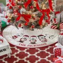 PEANUTS® Classic Caroling Quilted Tree Skirt