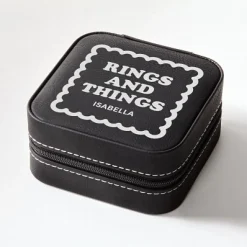 Rings and Things Travel Jewelry Box .product-info-decoration { display: inline-flex; justify-content: space-between; align-items: center; border-radius: 0.4rem; background-color: #E8E8E8; padding: 0.2rem 0.4rem; font-size: 1.4rem; line-height: 1.6rem; font-weight: var(--font-weight-semibold); letter-spacing: 0.042rem; text-transform: uppercase; --decoration-icon-url: ''; /* will be dynamically set */}.product-info-decoration.badge-icon::before { content: ''; width: 2rem; height: 2rem; background: var(--decoration-icon-url) no-repeat; background-size: 100% 100%; display: block; margin-right: 0.4rem;} Laser Engraved