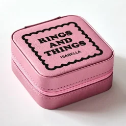 Rings and Things Travel Jewelry Box .product-info-decoration { display: inline-flex; justify-content: space-between; align-items: center; border-radius: 0.4rem; background-color: #E8E8E8; padding: 0.2rem 0.4rem; font-size: 1.4rem; line-height: 1.6rem; font-weight: var(--font-weight-semibold); letter-spacing: 0.042rem; text-transform: uppercase; --decoration-icon-url: ''; /* will be dynamically set */}.product-info-decoration.badge-icon::before { content: ''; width: 2rem; height: 2rem; background: var(--decoration-icon-url) no-repeat; background-size: 100% 100%; display: block; margin-right: 0.4rem;} Laser Engraved