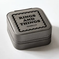 Rings and Things Travel Jewelry Box .product-info-decoration { display: inline-flex; justify-content: space-between; align-items: center; border-radius: 0.4rem; background-color: #E8E8E8; padding: 0.2rem 0.4rem; font-size: 1.4rem; line-height: 1.6rem; font-weight: var(--font-weight-semibold); letter-spacing: 0.042rem; text-transform: uppercase; --decoration-icon-url: ''; /* will be dynamically set */}.product-info-decoration.badge-icon::before { content: ''; width: 2rem; height: 2rem; background: var(--decoration-icon-url) no-repeat; background-size: 100% 100%; display: block; margin-right: 0.4rem;} Laser Engraved